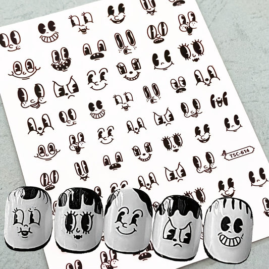 1 Sheet Black Cartoon Expression Nail Stickers, Self-Adhesive Plastic Nail Art Decals, Fantasy Themed Shimmery Finish, Rectangle Shape, Single Use, Glitter Embellishment, Unscented - DIY Manicure Decor